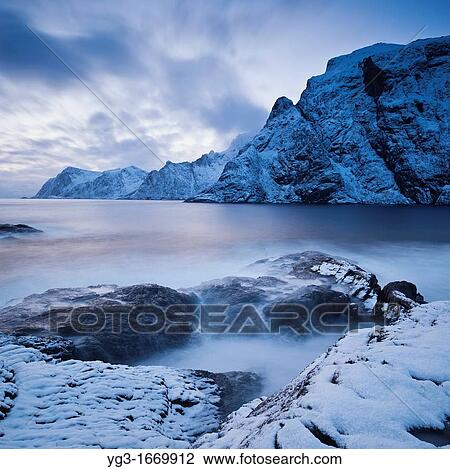 Dramatic scenery at snow covered coastline,? I Lofoten, Lofoten Islands, Norway View Large Photo Image Stock Image - Dramatic scenery at snow covered coastline,? I Lofoten, Lofoten Islands, Norway. Fotosearch