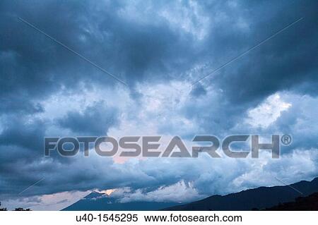 Dramatic sky, rain clouds View Large Photo Image Stock Photography - Dramatic sky, rain clouds. Fotosearch