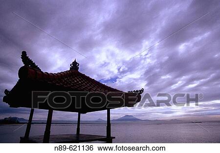 Dramatic sky. Sunrise. Sanur Beach. Bali. Indonesia View Large Photo Image Stock Photograph - Dramatic sky. Sunrise. Sanur Beach. Bali. Indonesia. Fotosearch