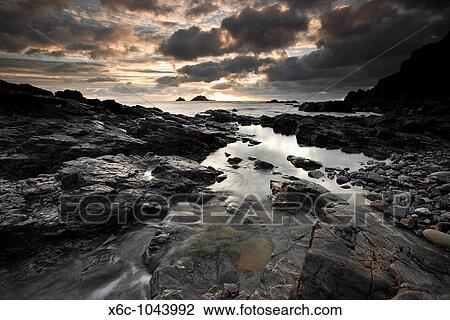 Dramatic Sunset at Priests Cove, Cape Cornwall England UK View Large Photo Image Stock Image - Dramatic Sunset at Priests Cove, Cape Cornwall England UK. Fotosearch
