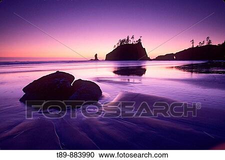 Stock Image - Dramatic sunset at Second Beach. Fotosearch
