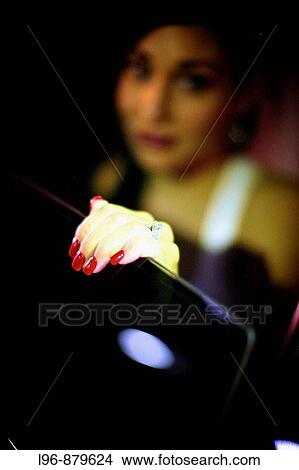 dramatic, vintage, retro bride looking out from limo/ auto View Large Photo Image Picture - dramatic, vintage, retro bride looking out from limo/ auto. Fotosearch