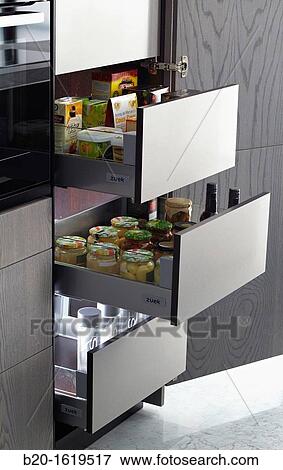 Drawers pantry, food storage, kitchen furniture, exhibition and sale View Large Photo Image Stock Photo - Drawers pantry, food storage, kitchen furniture, exhibition and sale. Fotosearch