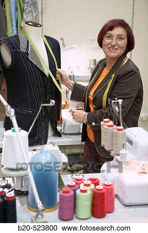 Dressmaking workshop, clothes arrangements. Retail. Elgoibar, Gipuzkoa, Euskadi. Spain. View Large Photo Image Stock Image - Dressmaking workshop, clothes arrangements. Retail. Elgoibar, Gipuzkoa, Euskadi. Spain.. Fotosearch