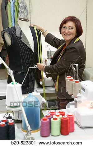 Dressmaking workshop, clothes arrangements. Retail. Elgoibar, Gipuzkoa, Euskadi. Spain. View Large Photo Image Stock Image - Dressmaking workshop, clothes arrangements. Retail. Elgoibar, Gipuzkoa, Euskadi. Spain.. Fotosearch