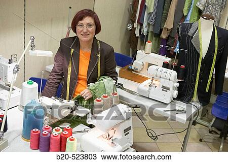 Dressmaking workshop, clothes arrangements. Retail. Elgoibar, Gipuzkoa, Euskadi. Spain. View Large Photo Image Stock Image - Dressmaking workshop, clothes arrangements. Retail. Elgoibar, Gipuzkoa, Euskadi. Spain.. Fotosearch