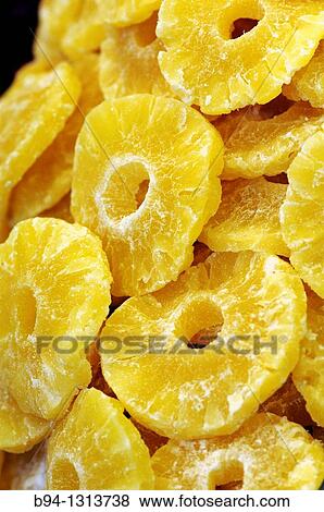 Dried pineapple slices in the Sant Josep market (aka La Boqueria), Barcelona, Catalonia, Spain View Large Photo Image Stock Photo - Dried pineapple slices in the Sant Josep market (aka La Boqueria), Barcelona, Catalonia, Spain. Fotosearch