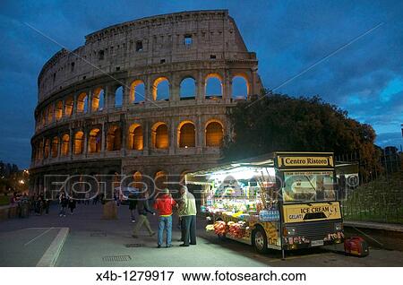 Drink and sweet stall outside Colousseum at dusk central Rome Italy Europe View Large Photo Image Stock Photo - Drink and sweet stall outside Colousseum at dusk central Rome Italy Europe. Fotosearch