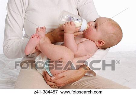 Drinking baby View Large Photo Image Stock Photo - Drinking baby. Fotosearch