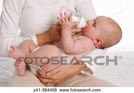 Stock Photograph - Drinking baby. Fotosearch
