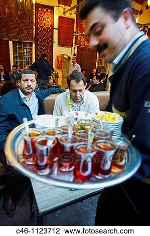 Drinking tea and Smoking Narghiles. Grand Bazaar. Istanbul. Turkey. View Large Photo Image Stock Image - Drinking tea and Smoking Narghiles. Grand Bazaar. Istanbul. Turkey.. Fotosearch