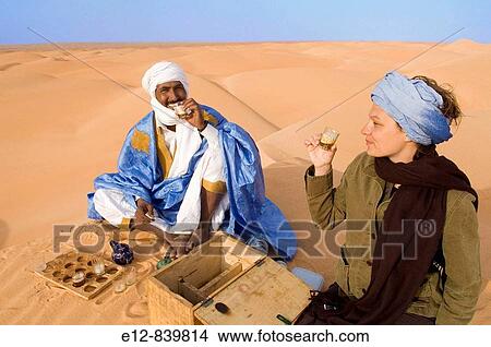 Drinking tea in the desert, Chinguetti. Adrar Plateau, Sahara Desert, Mauritania View Large Photo Image Picture - Drinking tea in the desert, Chinguetti. Adrar Plateau, Sahara Desert, Mauritania. Fotosearch