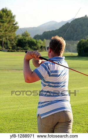 Stock Image - Drive Golf lessons Golf course La Sella Denia Alicante Spain. Fotosearch
