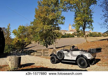 Drive with an open touring vintage car Renault of 1925 around Lavardens, Gers department, Midi-Pyrenees, southwest of France, Europe View Large Photo Image Stock Image - Drive with an open touring vintage car Renault of 1925 around Lavardens, Gers department, Midi-Pyrenees, southwest of France, Europe. Fotosearch