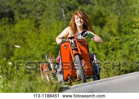 Driving an old rotten three-wheeler motorcycle View Large Photo Image Stock Image - Driving an old rotten three-wheeler motorcycle. Fotosearch