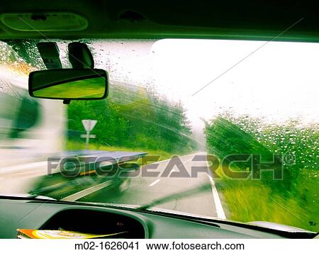Driving in a rainy day, Navarre, Spain View Large Photo Image Stock Image - Driving in a rainy day, Navarre, Spain. Fotosearch