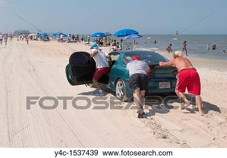 Driving on Daytona Beach, Florida, USA View Large Photo Image Stock Photo - Driving on Daytona Beach, Florida, USA. Fotosearch