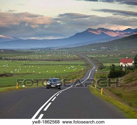 Stock Photo - Driving past Icelandic farms, Eyjafjordur, Northern Iceland. Fotosearch