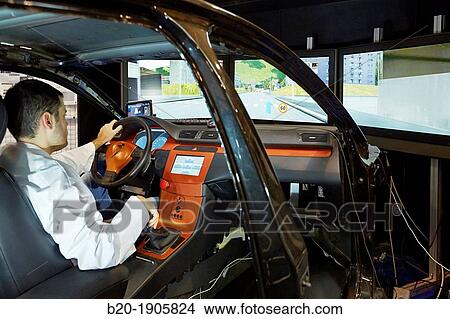 Driving Simulator Test Validation of eco-driving systems, platooning systems road trains, driver behavior to different types of situations acoustic, visual or vibro-tactile View Large Photo Image Picture - Driving Simulator Test Validation of eco-driving systems, platooning systems road trains, driver behavior to different types of situations acoustic, visual or vibro-tactile. Fotosearch