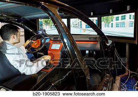 Driving Simulator Test Validation of eco-driving systems, platooning systems road trains, driver behavior to different types of situations acoustic, visual or vibro-tactile View Large Photo Image Stock Image - Driving Simulator Test Validation of eco-driving systems, platooning systems road trains, driver behavior to different types of situations acoustic, visual or vibro-tactile. Fotosearch