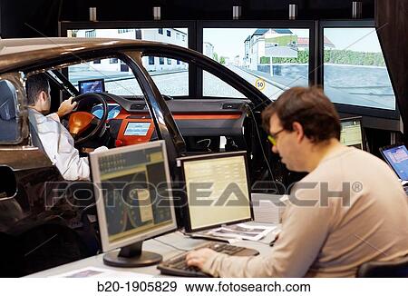 Driving Simulator Test Validation of eco-driving systems, platooning systems road trains, driver behavior to different types of situations acoustic, visual or vibro-tactile View Large Photo Image Stock Photo - Driving Simulator Test Validation of eco-driving systems, platooning systems road trains, driver behavior to different types of situations acoustic, visual or vibro-tactile. Fotosearch