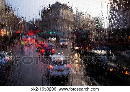 Drops and rain and traffic jam from a bus window, near Borough Market, London, UK View Large Photo Image Stock Photograph - Drops and rain and traffic jam from a bus window, near Borough Market, London, UK. Fotosearch