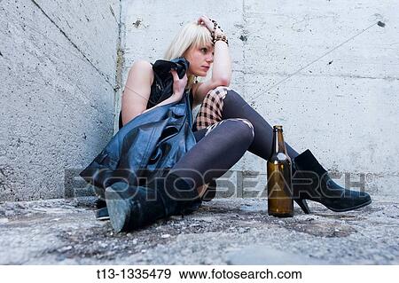 Drunk and exhausted young woman View Large Photo Image Stock Photo - Drunk and exhausted young woman. Fotosearch