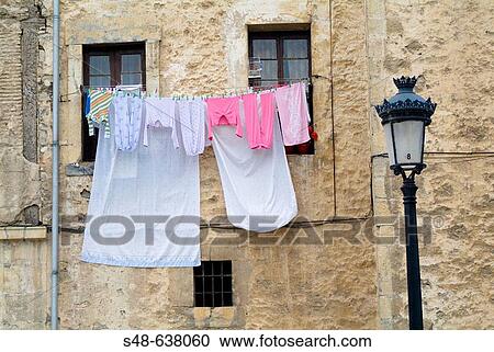 Drying clothes in an old building in Ordua, Vizcaya. Spain. View Large Photo Image Stock Image - Drying clothes in an old building in Ordua, Vizcaya. Spain.. Fotosearch