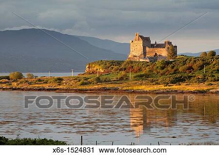 Stock Image - Duart Castle at sunset in Isle of Mull, Argyll and Bute, Scotland. Fotosearch