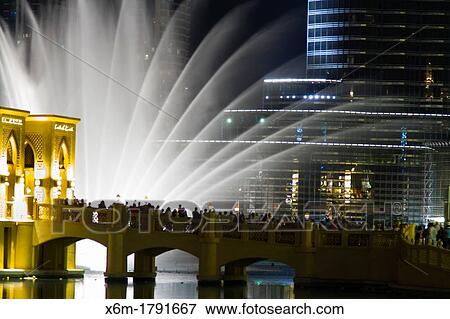 Dubai Fountain Burj Khalifa Lake Dubai city Dubai United Arab Emirates View Large Photo Image Stock Photo - Dubai Fountain Burj Khalifa Lake Dubai city Dubai United Arab Emirates. Fotosearch