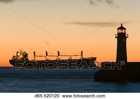 Duluth Harbor. Shipping Channel Lighthouse at Dawn with Freighter. Duluth. Minnesota. USA. View Large Photo Image Stock Image - Duluth Harbor. Shipping Channel Lighthouse at Dawn with Freighter. Duluth. Minnesota. USA.. Fotosearch