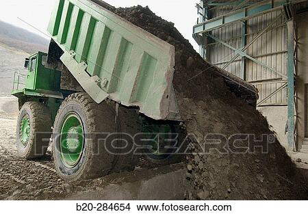 Dumper-truck unloading marl at quarry, cement plant View Large Photo Image Picture - Dumper-truck unloading marl at quarry, cement plant. Fotosearch
