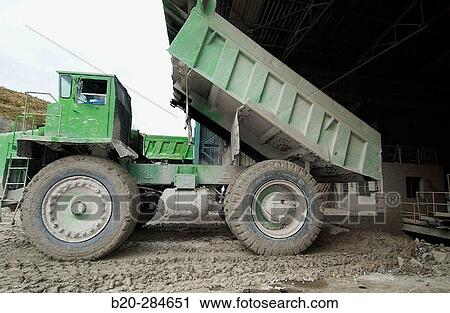 Dumper-truck unloading marl at quarry, cement plant View Large Photo Image Stock Image - Dumper-truck unloading marl at quarry, cement plant. Fotosearch