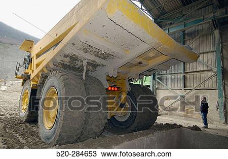 Dumper-truck unloading marl at quarry, cement plant View Large Photo Image Stock Image - Dumper-truck unloading marl at quarry, cement plant. Fotosearch