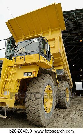 Dumper-truck unloading marl at quarry, cement plant View Large Photo Image Stock Photo - Dumper-truck unloading marl at quarry, cement plant. Fotosearch