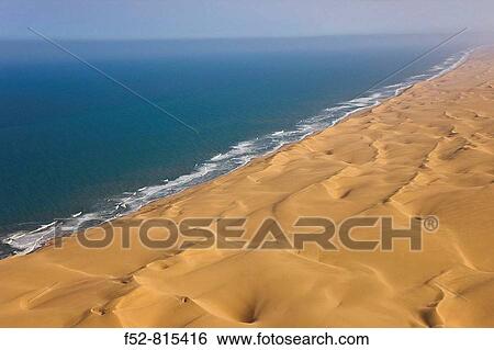 Dunes and Atlantic Ocean, Namib desert, Swakopmund, Namibia View Large Photo Image Stock Photograph - Dunes and Atlantic Ocean, Namib desert, Swakopmund, Namibia. Fotosearch