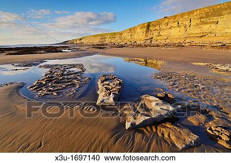 Stock Image - Dunraven bay in the winter sun at Southerndown on the Glamorgan Heritage Coast, Wales. Fotosearch