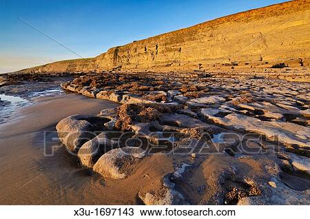 Dunraven bay in the winter sun at Southerndown on the Glamorgan Heritage Coast, Wales View Large Photo Image Stock Image - Dunraven bay in the winter sun at Southerndown on the Glamorgan Heritage Coast, Wales. Fotosearch
