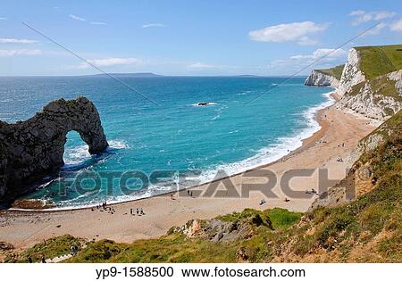 Stock Image - Durdle Door and Durdle Cove, Dorset, England. Fotosearch