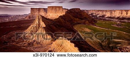 Dusk in Bardenas Blancas area, grain fields on the right, Bardenas reales natural park, Navarre, Spain View Large Photo Image Picture - Dusk in Bardenas Blancas area, grain fields on the right, Bardenas reales natural park, Navarre, Spain. Fotosearch