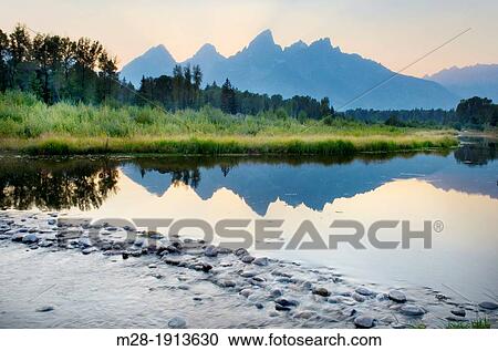Dusk over the Teton Range from Schwabacher's Landing, Grand Teton National Park Wyoming View Large Photo Image Stock Image - Dusk over the Teton Range from Schwabacher's Landing, Grand Teton National Park Wyoming. Fotosearch