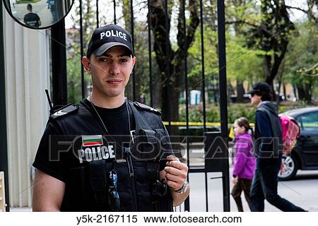 Stock Photography - Dutch Embassy, Ulitsa Oborishte, Sofia, Bulgaria. Mr. Bogdan Nikolaev Dimitrov is a member of the Bulgarian Special police Forces. One of his duties is to protect foreign Embassies in Bulgaria's capital.. Fotosearch