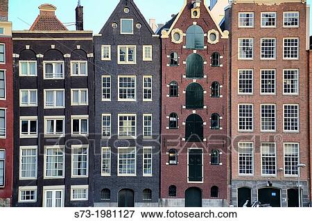 Stock Photo - Dutch houses, Canal, Amsterdam, Netherlands. Fotosearch