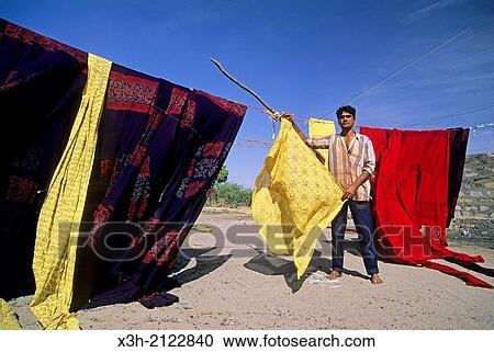 dyed and printed fabrics drying in the village of Dhamanka, Kutch district, Gujarat, India, South Asia. View Large Photo Image Stock Image - dyed and printed fabrics drying in the village of Dhamanka, Kutch district, Gujarat, India, South Asia.. Fotosearch