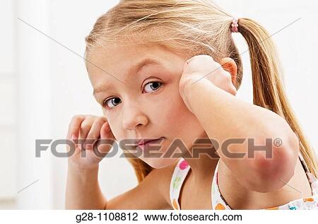 ear problems or too much noise little girl 7 View Large Photo Image Stock Image - ear problems or too much noise little girl 7. Fotosearch