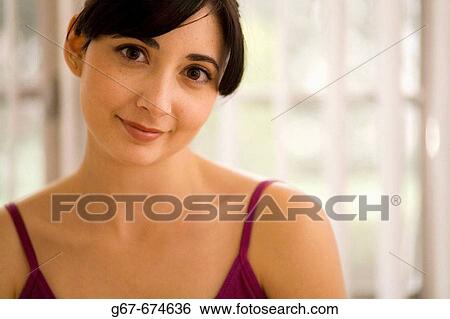 Early 20s brunette caucasian shows off her sweet smile and levely large brown eyes in head and shoulders portrait in a Los Angeles, CA, USA home. View Large Photo Image Stock Photograph - Early 20s brunette caucasian shows off her sweet smile and levely large brown eyes in head and shoulders portrait in a Los Angeles, CA, USA home.. Fotosearch
