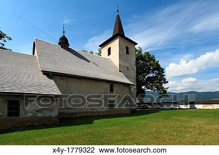 Stock Image - Early gothic church in Ludrova near Ruzomberok, Slovakia The interior of the church is covered with valuable historic fresco's depicting tales from Holy Bible. Fotosearch