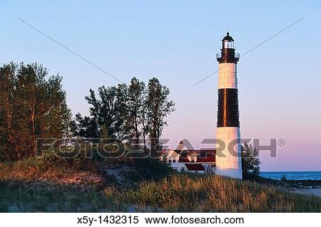 Early morning light on Big Sable Lighthouse, Built in 1867 and locted in Ludington State Park on Michigan's Lake Michigan, United States View Large Photo Image Stock Photography - Early morning light on Big Sable Lighthouse, Built in 1867 and locted in Ludington State Park on Michigan's Lake Michigan, United States. Fotosearch