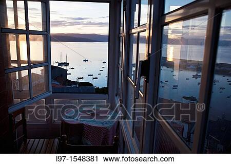 Early morning view from hostel window over the harbor in the village of finisterre northern Spain View Large Photo Image Stock Image - Early morning view from hostel window over the harbor in the village of finisterre northern Spain. Fotosearch