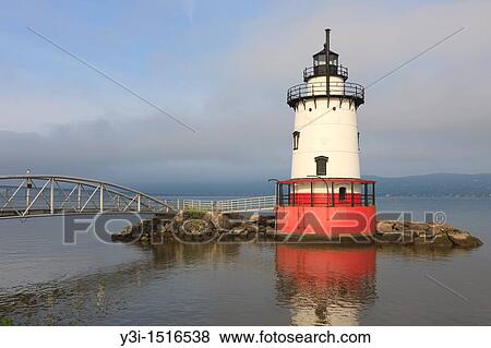 Stock Photo - Early morning view of the Tarrytown Lighthouse, on the Hudson River near the village of Sleepy Hollow, New York, USA. Fotosearch
